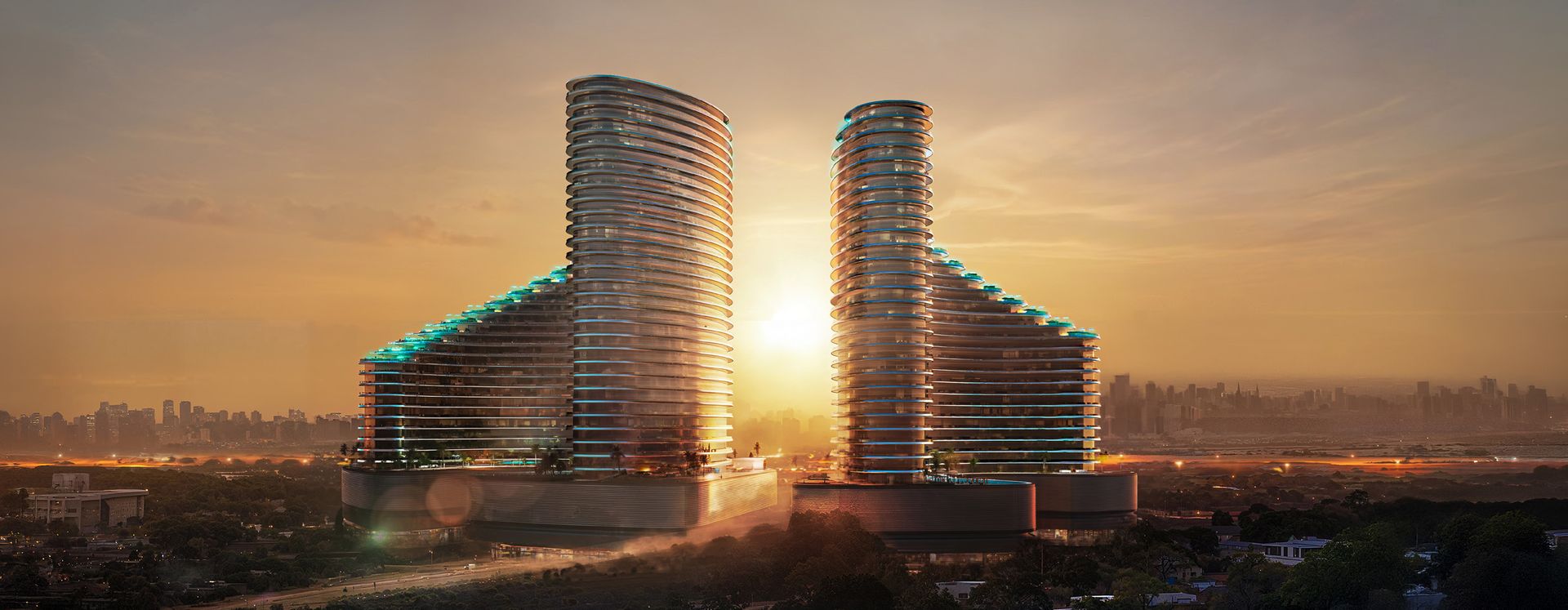 Binghatti Skyflame twin towers at sunset
