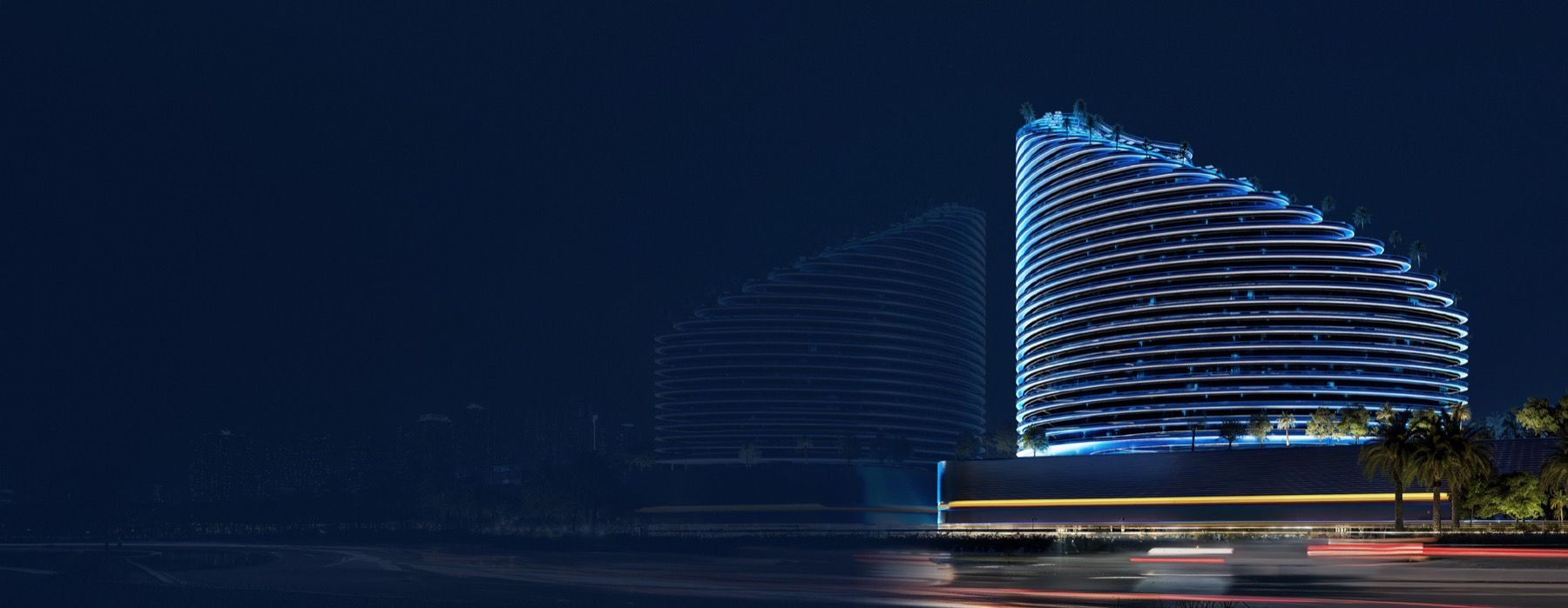 Binghatti Skyflame illuminated at night