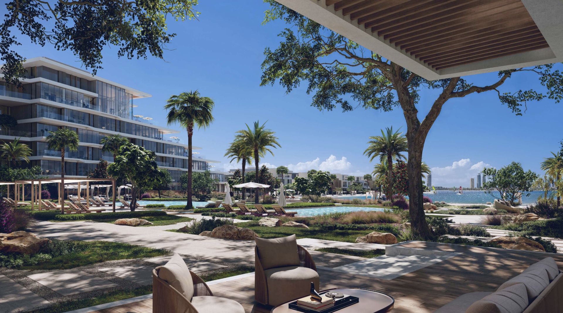Palm Central — Landscaped gardens and pool area